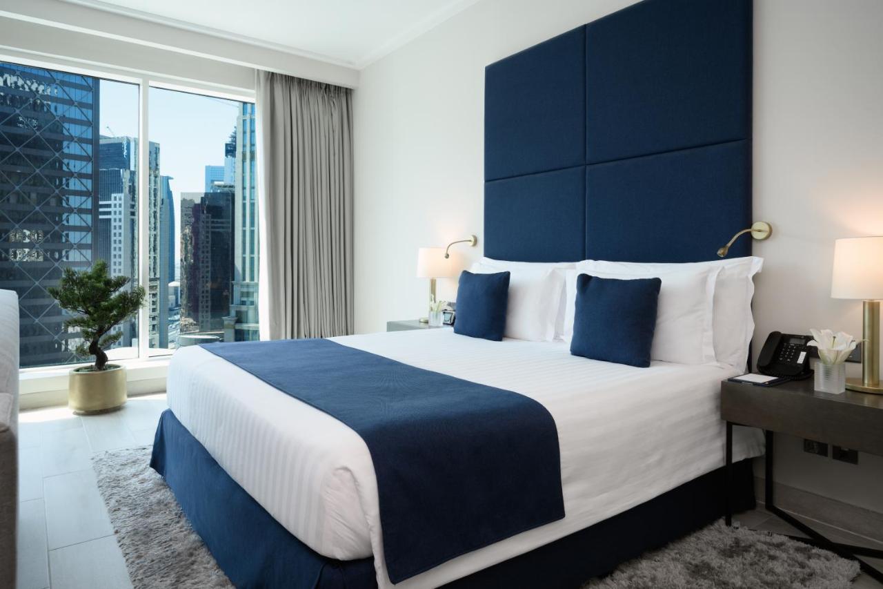 Centara West Bay Hotel & Residences Доха Экстерьер фото A bedroom at the hotel