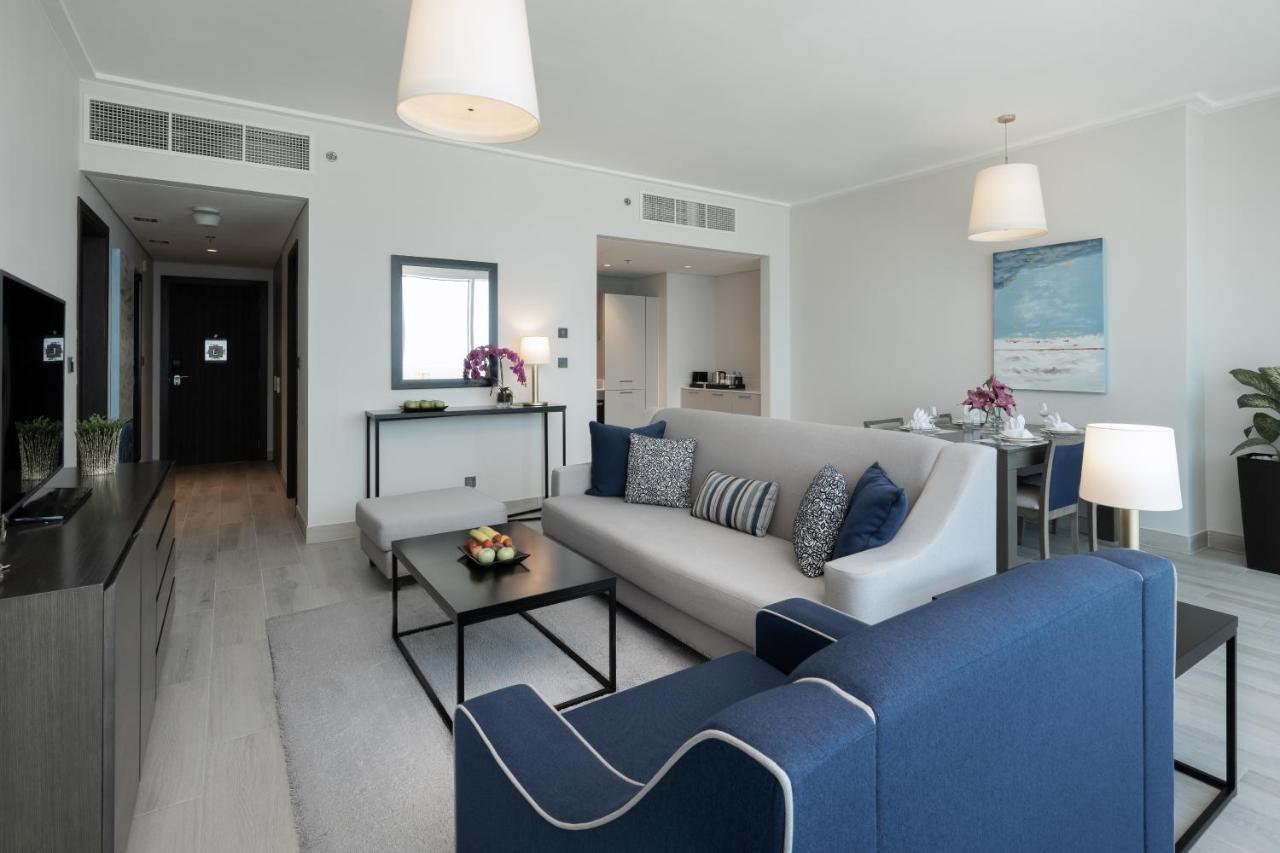 Centara West Bay Hotel & Residences Доха Экстерьер фото A living room at the Address Downtown Hotel