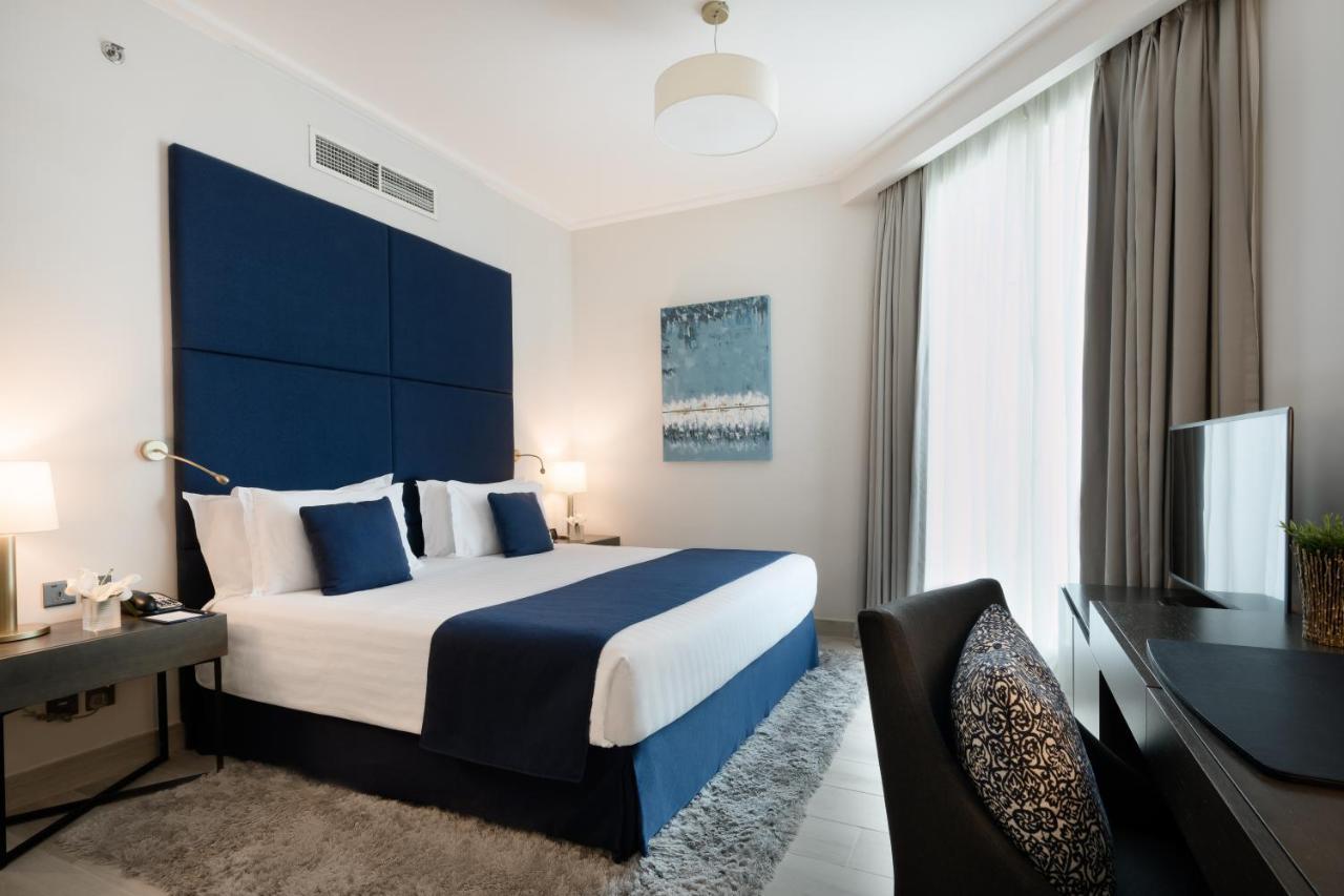 Centara West Bay Hotel & Residences Доха Экстерьер фото Deluxe room